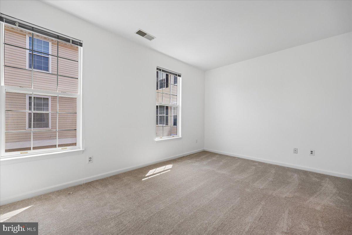 12700 Found Stone Road, Unit 206 Germantown, MD 20876 - Photo 22 of 38 Primary Bedroom with 2 windows