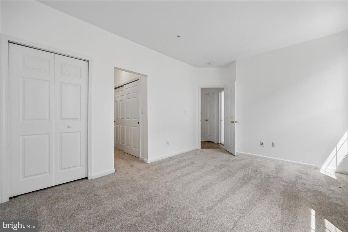 12700 Found Stone Road, Unit 206 Germantown, MD 20876 - Photo 24 of 38 Primary Bedroom with 3 Closets