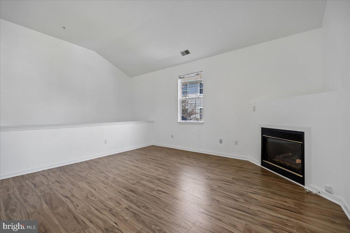 12700 Found Stone Road, Unit 206 Germantown, MD 20876 - Photo 8 of 38 Living Room with Vaulted Ceilings