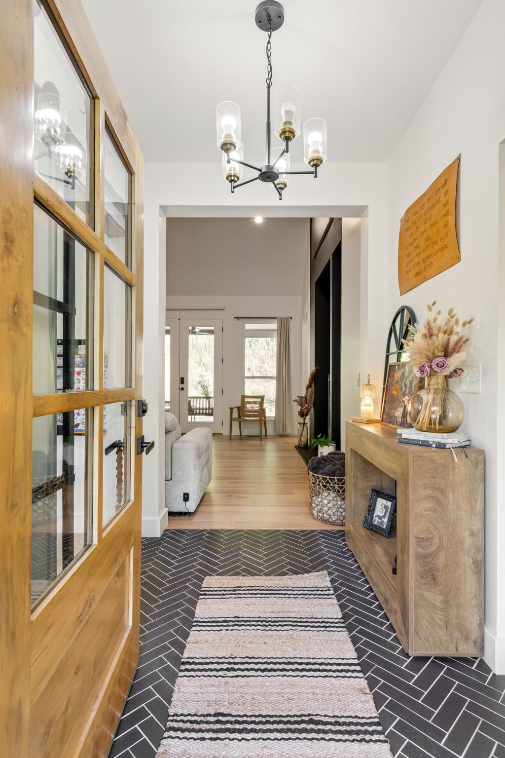 2320 Stephens Road Columbia, TN 38401 - Photo 5 of 47 a view of an entryway with wooden floor and a chandelier