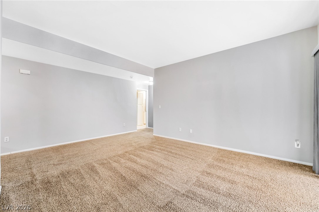 2050 West Warm Springs Road, Unit 2411 Henderson, NV 89014 - Photo 10 of 37 A spacious, open interior with plush carpeting awaits your personal touch.