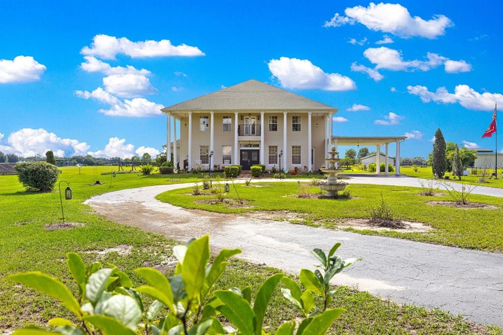 12345 Northeast 14th Avenue Anthony, FL 32617 - Photo 20 of 91 a view of a swimming pool with a garden