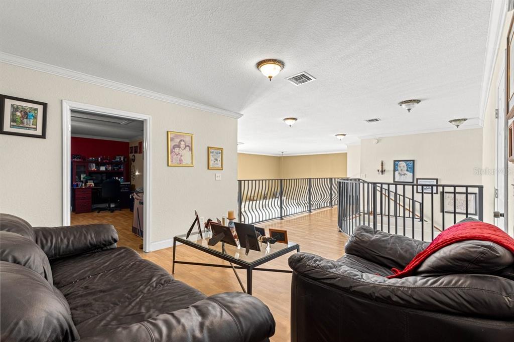 12345 Northeast 14th Avenue Anthony, FL 32617 - Photo 85 of 91 a living room with furniture and a wooden floor