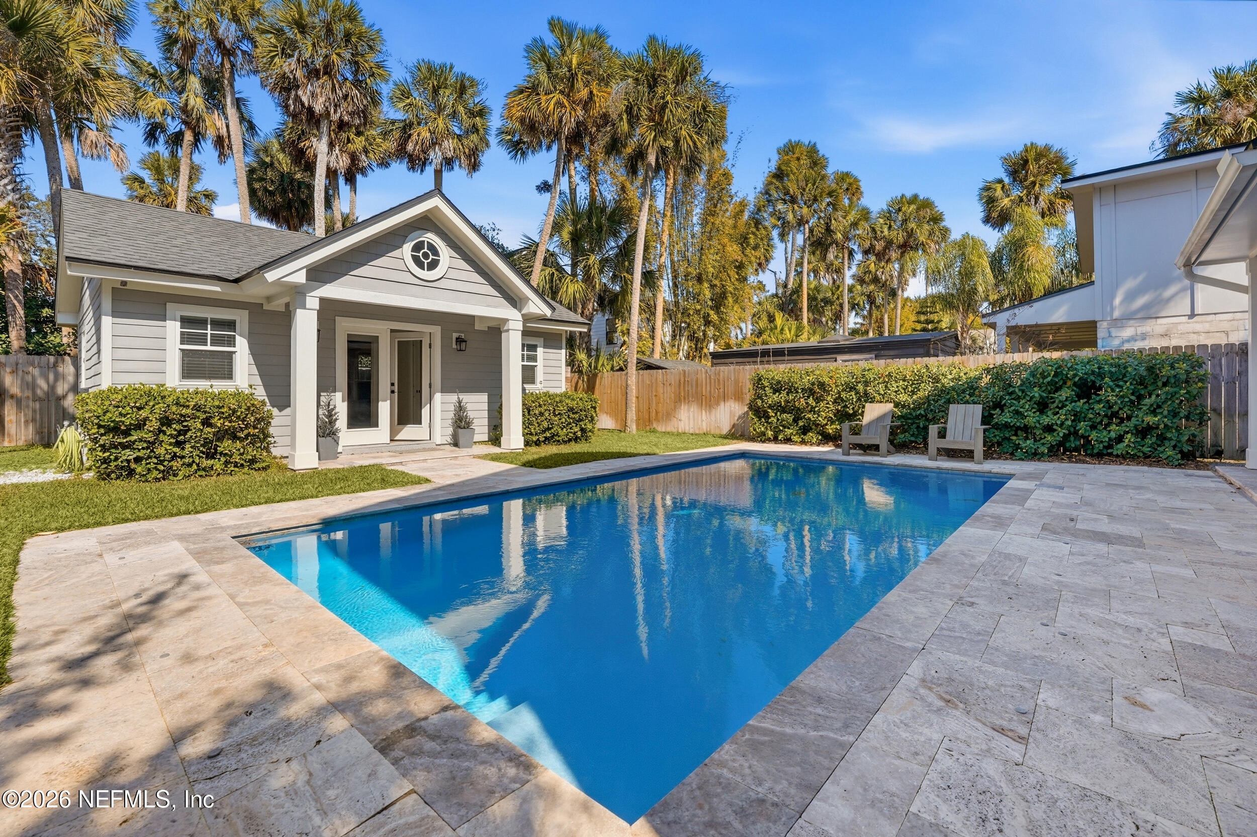 335 10th Street Atlantic Beach, FL 32233 - Photo 2 of 2 a view of a house with large windows