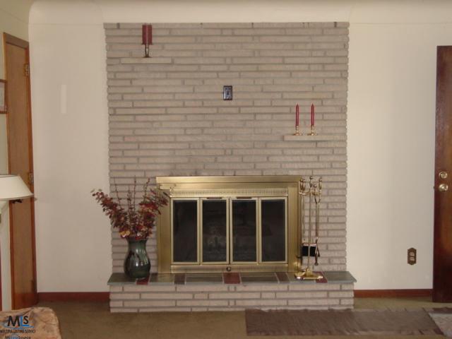 62 West Lapeer Road Peck, MI 48466 - Photo 15 of 25 This is a close up view of the fireplace.