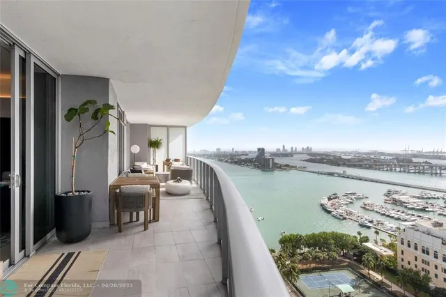 a view of roof deck with patio