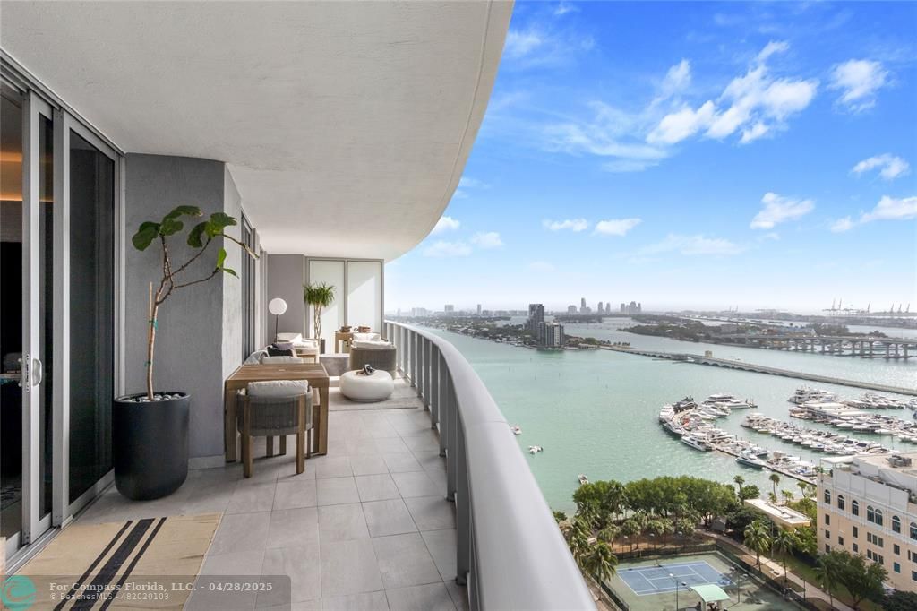 a view of roof deck with patio