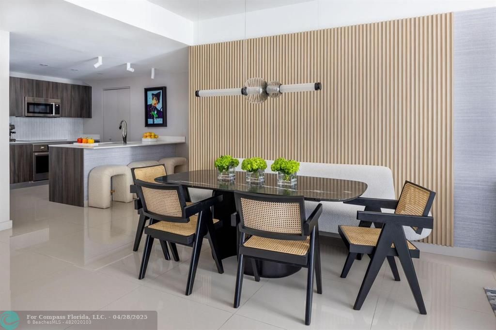 488 Northeast 18th Street, Unit 2010 Miami, FL 33132 - Photo 4 of 15 a view of a dining room with furniture