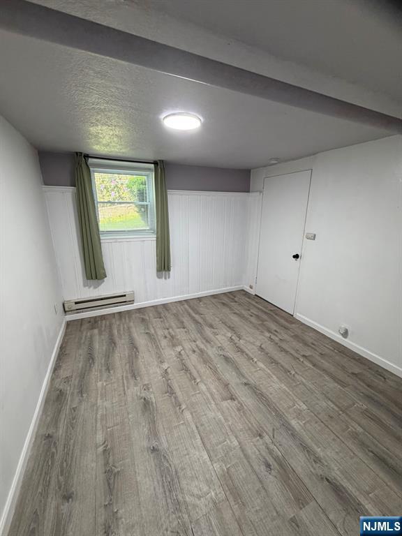 1283 Valley Road, Unit 7 Montclair, NJ 07043 - Photo 10 of 26 a view of empty room with wooden floor