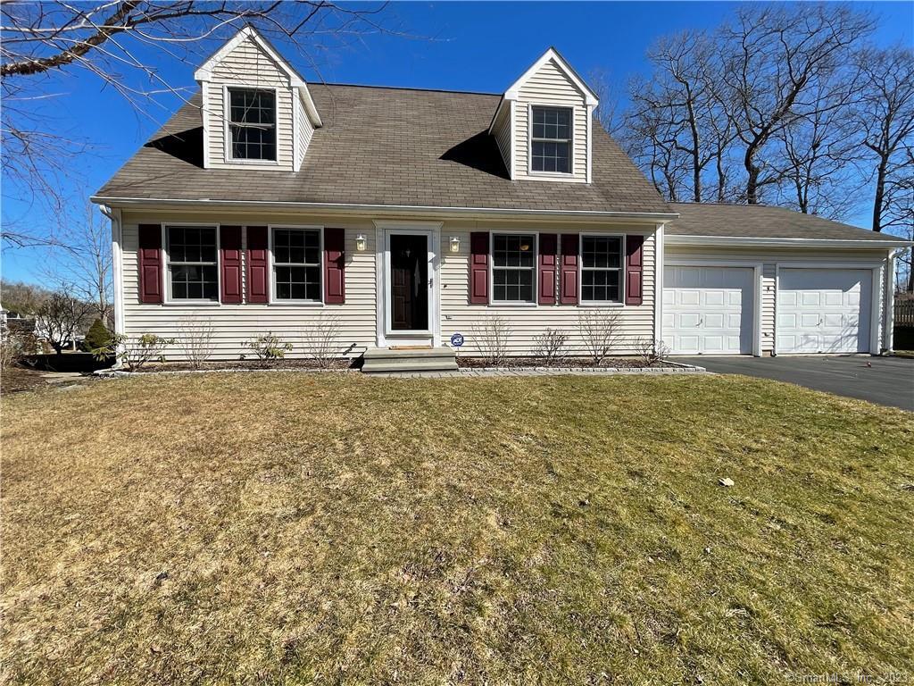 Cape Cod style with two charming dormers.