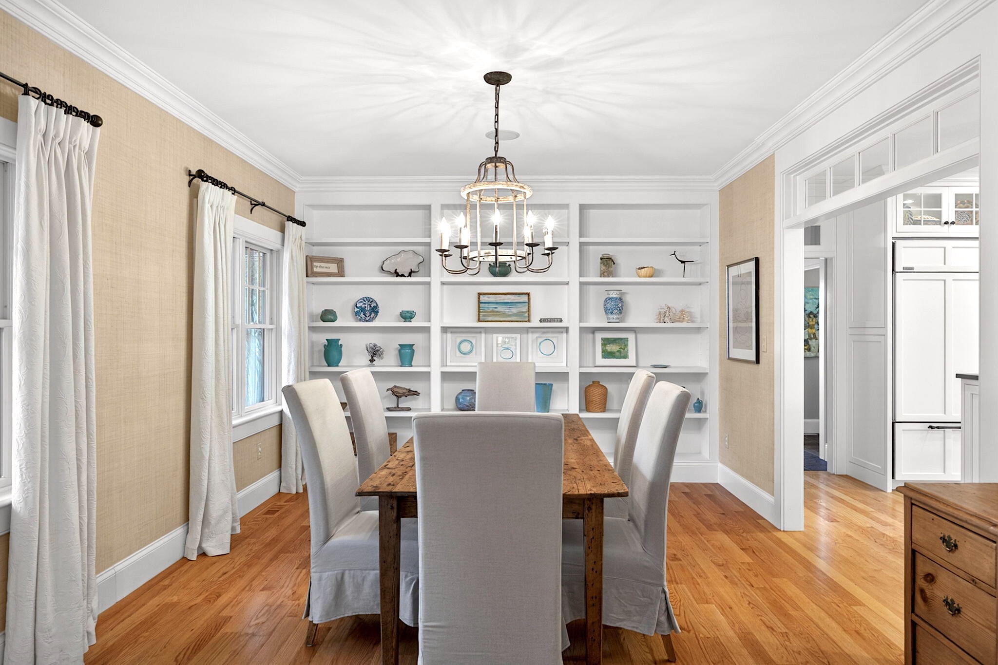 205 Little River Road Cotuit, MA 02635 - Photo 19 of 60 a view of a dining room with furniture window and wooden floor