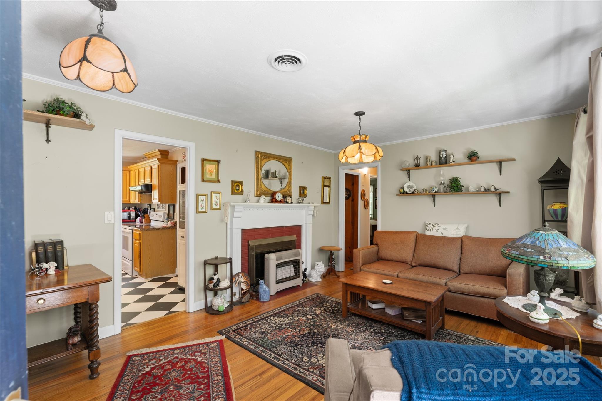 25 Wall Road Tryon, NC 28782 - Photo 4 of 21 a living room with furniture fireplace and window