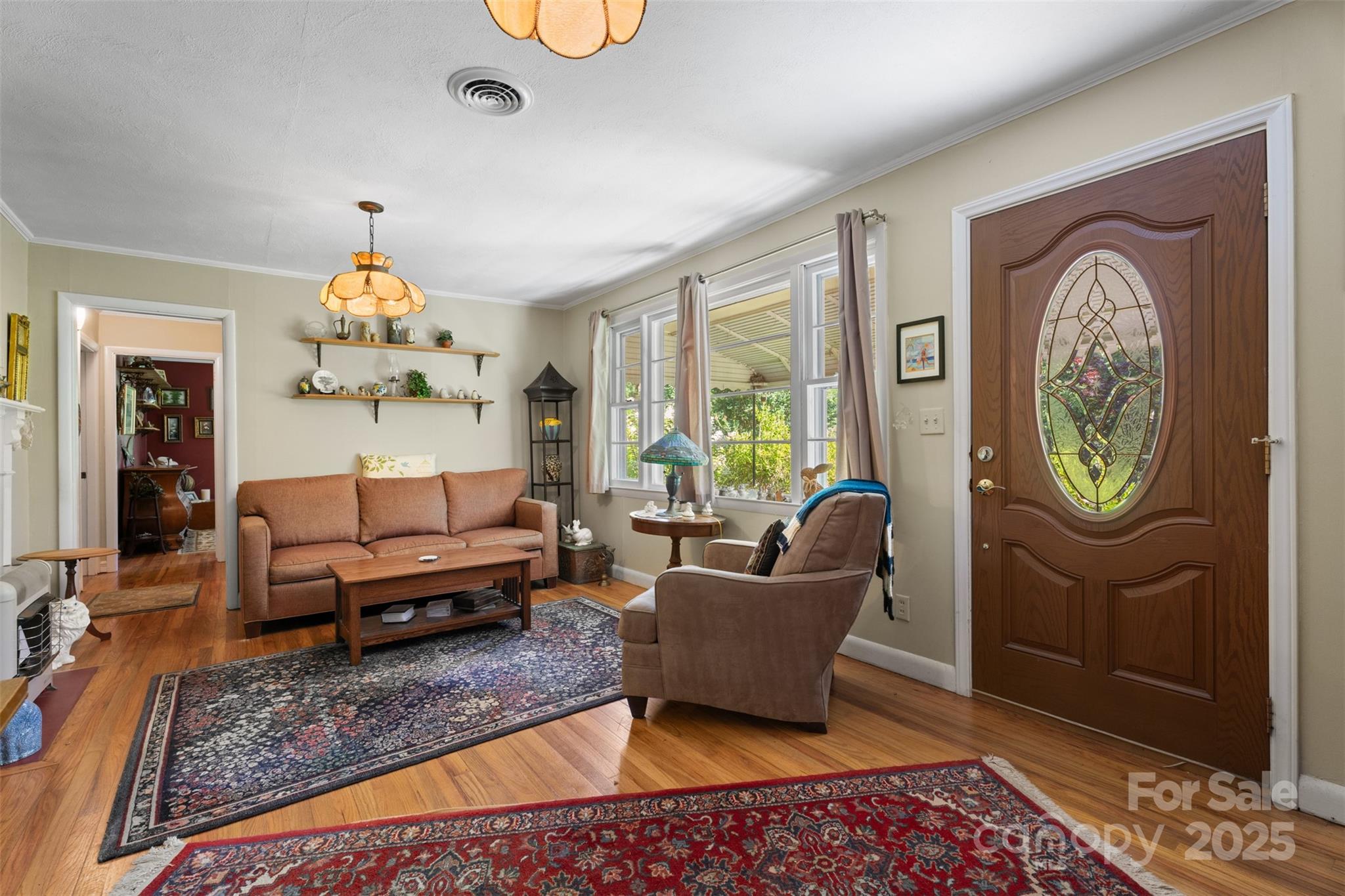 25 Wall Road Tryon, NC 28782 - Photo 5 of 21 a living room with furniture a rug and a window