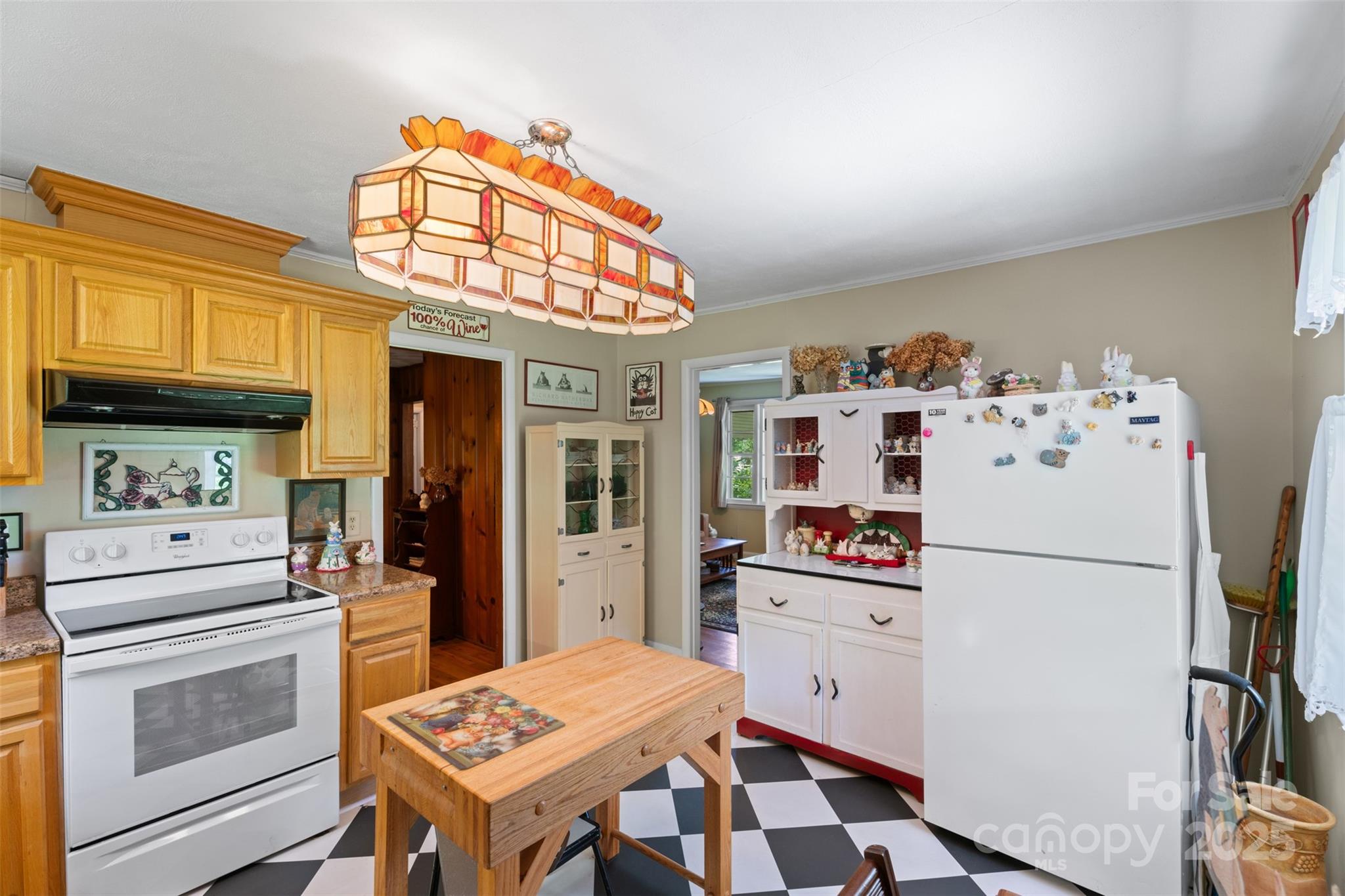 25 Wall Road Tryon, NC 28782 - Photo 8 of 21 a kitchen with stainless steel appliances a refrigerator and a stove top oven