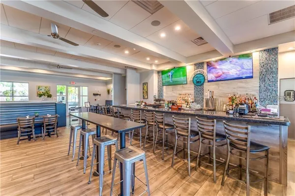 a kitchen with a table and chairs in it