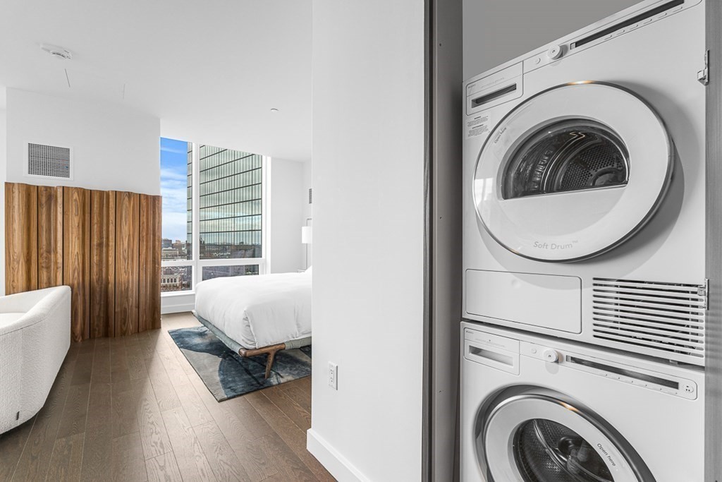 40 Trinity Place, Unit 1614 Boston, MA 02116 - Photo 17 of 26 a living room with furniture and a large window