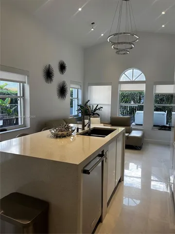 a kitchen with a sink and a stove