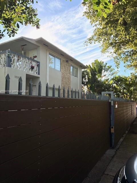 1030 Northeast 80th Street, Unit 1 Miami, FL 33138 - Photo 22 of 22 a view of a house with a street