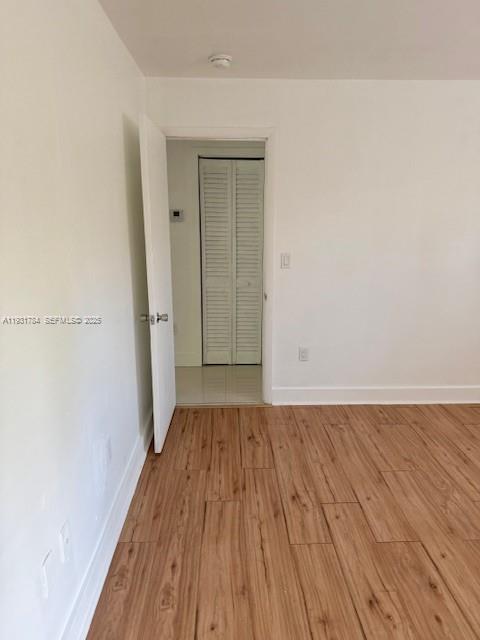 1030 Northeast 80th Street, Unit 1 Miami, FL 33138 - Photo 5 of 22 a view of a room with wooden floor and a sink