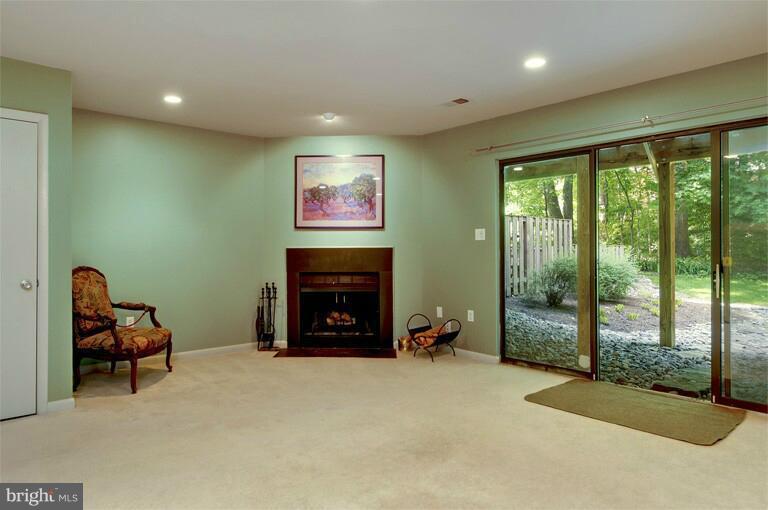2038 Swans Neck Way Reston, VA 20191 - Photo 11 of 27 a view of a livingroom with furniture and a fireplace