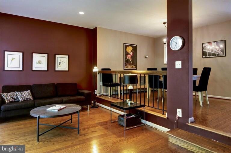 2038 Swans Neck Way Reston, VA 20191 - Photo 14 of 27 a living room with furniture and wooden floor