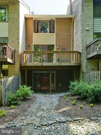 2038 Swans Neck Way Reston, VA 20191 - Photo 23 of 27 a view of a house with a garden