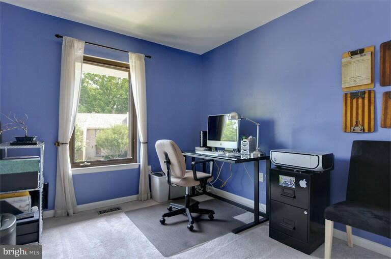 2038 Swans Neck Way Reston, VA 20191 - Photo 24 of 27 a view of a workspace with furniture and a window