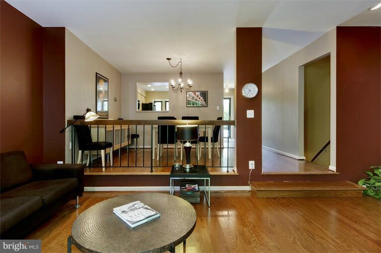 2038 Swans Neck Way Reston, VA 20191 - Photo 4 of 27 a living room with furniture and wooden floor