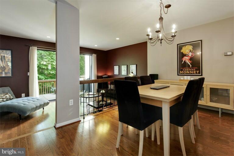 2038 Swans Neck Way Reston, VA 20191 - Photo 7 of 27 a view of a dining room with furniture and wooden floor