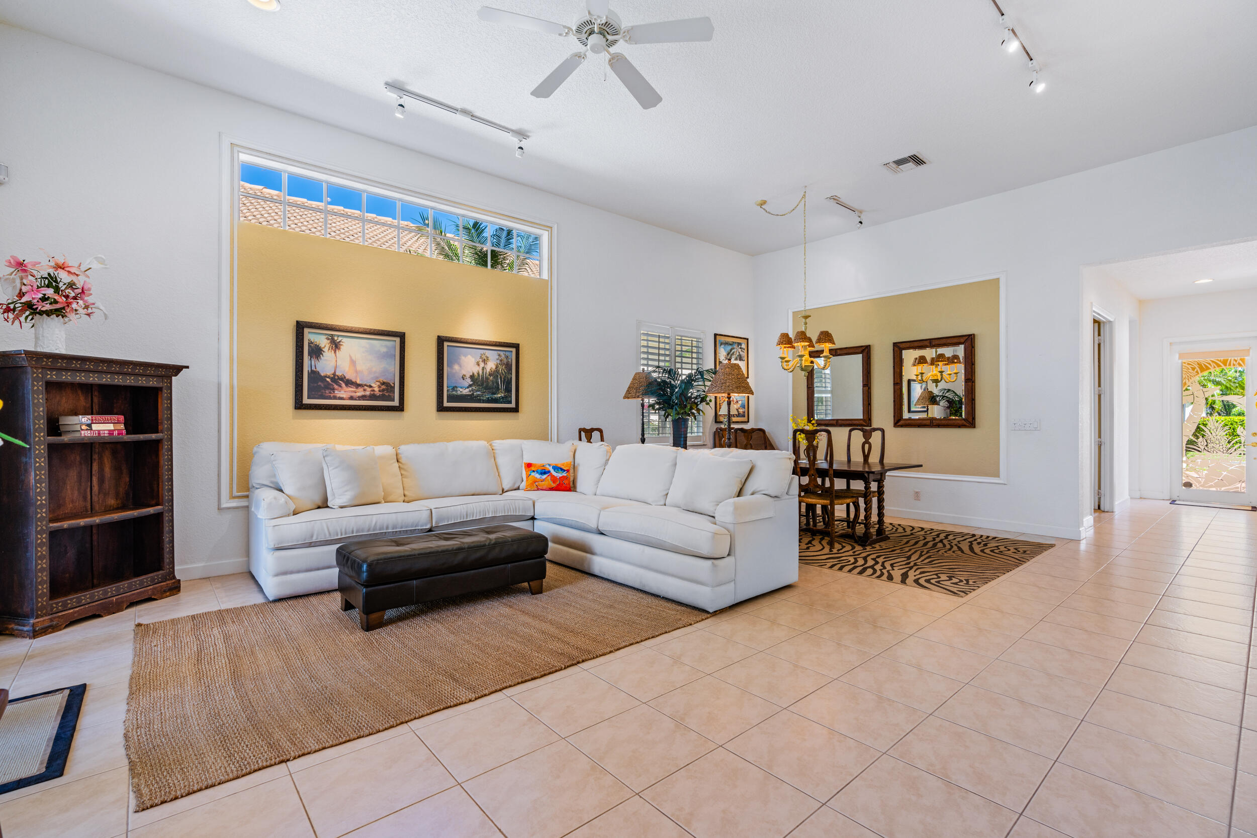 108 Palmfield Way Jupiter, FL 33458 - Photo 16 of 30 a living room with furniture and a large window