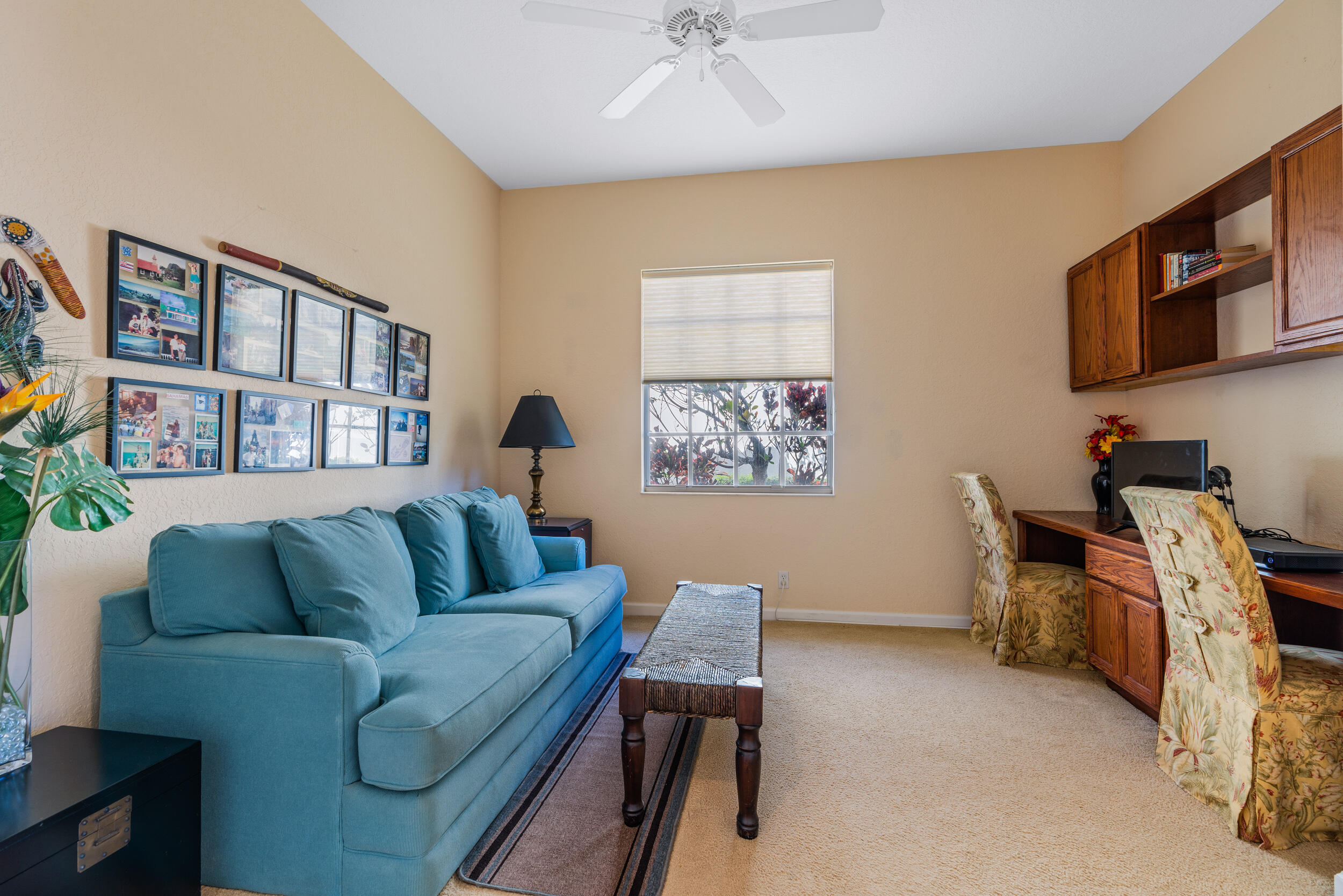 108 Palmfield Way Jupiter, FL 33458 - Photo 19 of 30 a living room with furniture and a flat screen tv