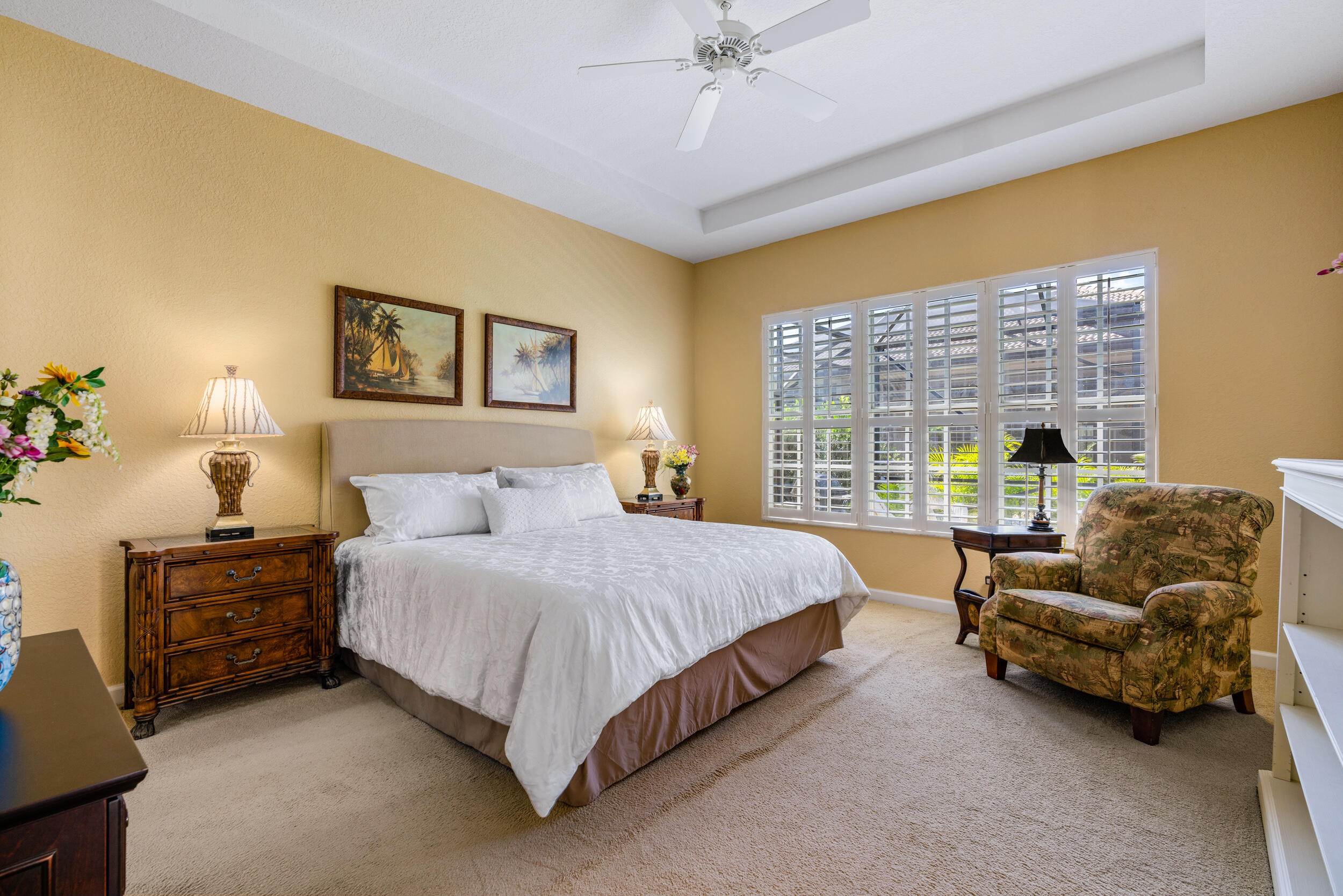 108 Palmfield Way Jupiter, FL 33458 - Photo 20 of 30 a spacious bedroom with a bed and a couch