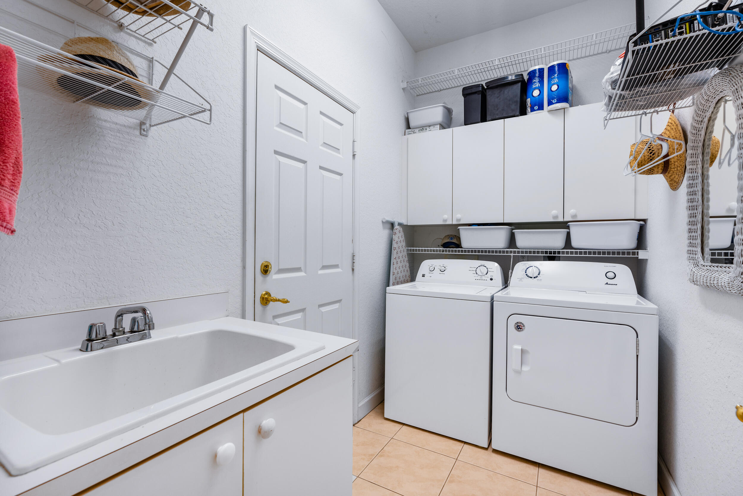 108 Palmfield Way Jupiter, FL 33458 - Photo 23 of 30 a utility room with dryer and washer