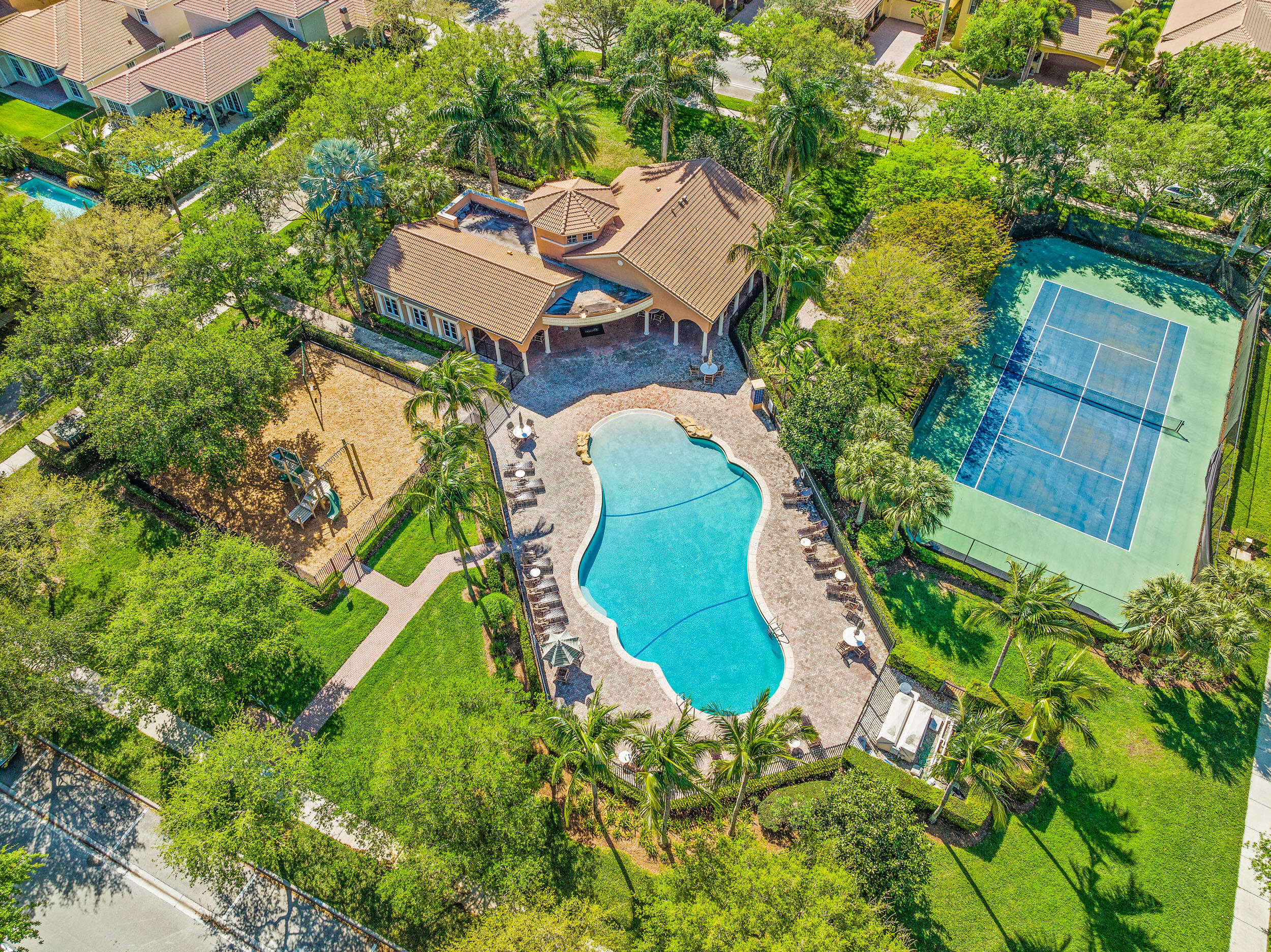 108 Palmfield Way Jupiter, FL 33458 - Photo 25 of 30 an aerial view of a house with a garden and trees