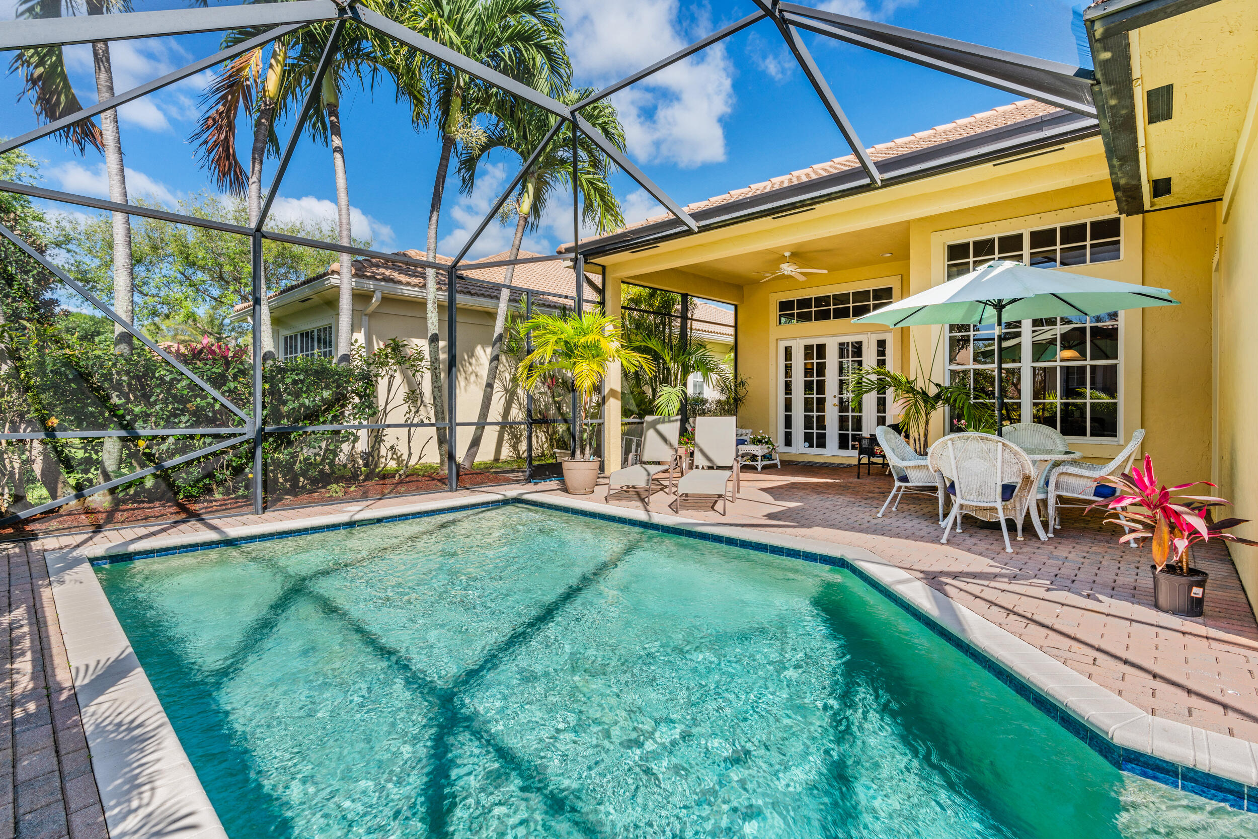 108 Palmfield Way Jupiter, FL 33458 - Photo 4 of 30 a view of outdoor space yard deck patio and swimming pool