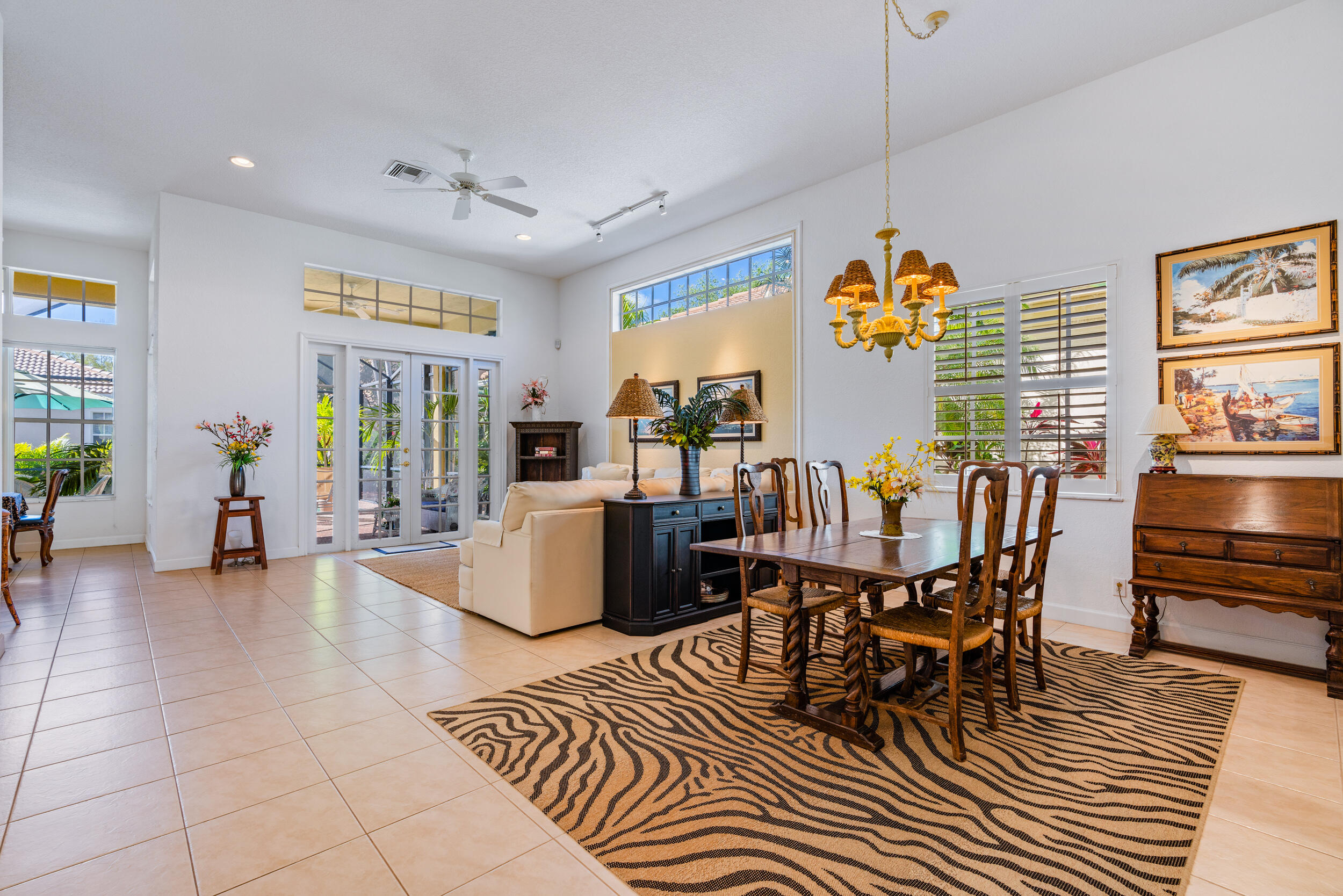 108 Palmfield Way Jupiter, FL 33458 - Photo 8 of 30 a view of a dining room with furniture window and wooden floor