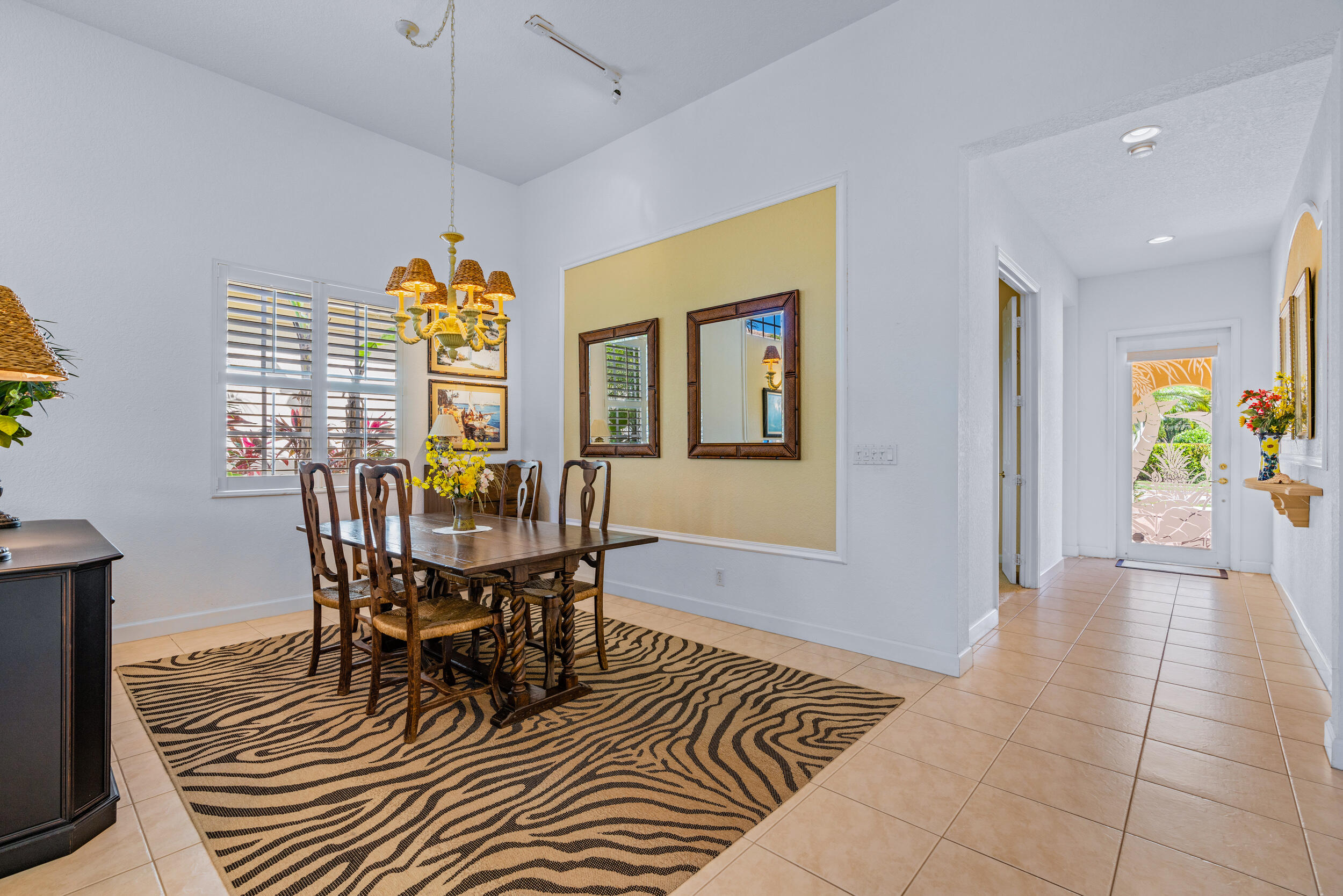 108 Palmfield Way Jupiter, FL 33458 - Photo 9 of 30 a view of a dining room with furniture