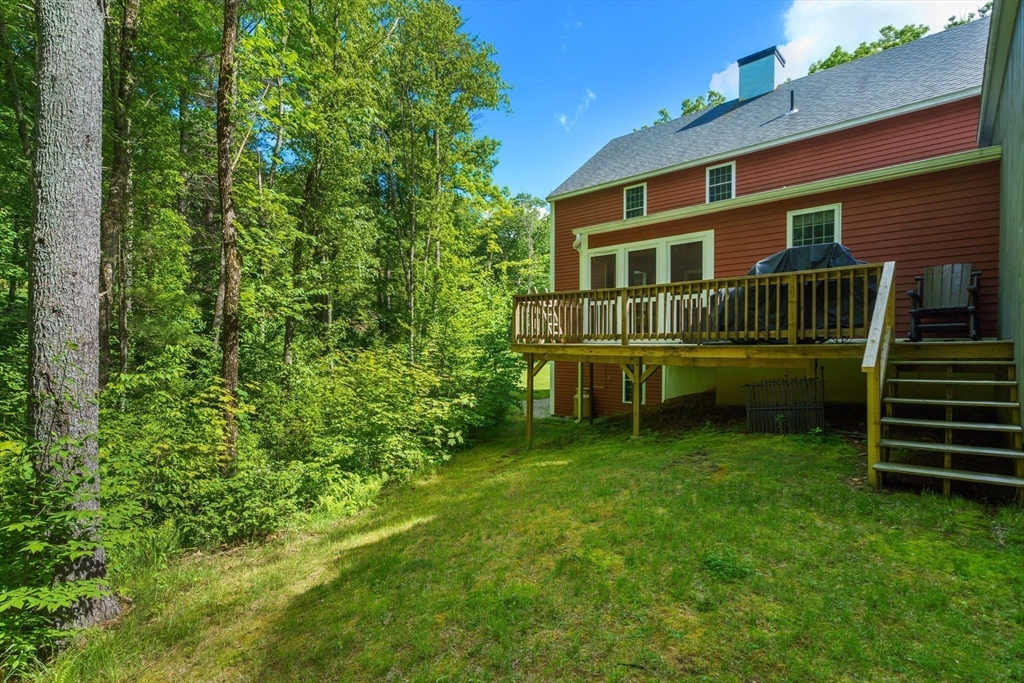 33 Champeaux Road Brimfield, MA 01010 - Photo 24 of 32 a front view of a house with a garden