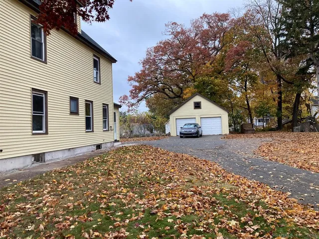 a house with trees in front of it