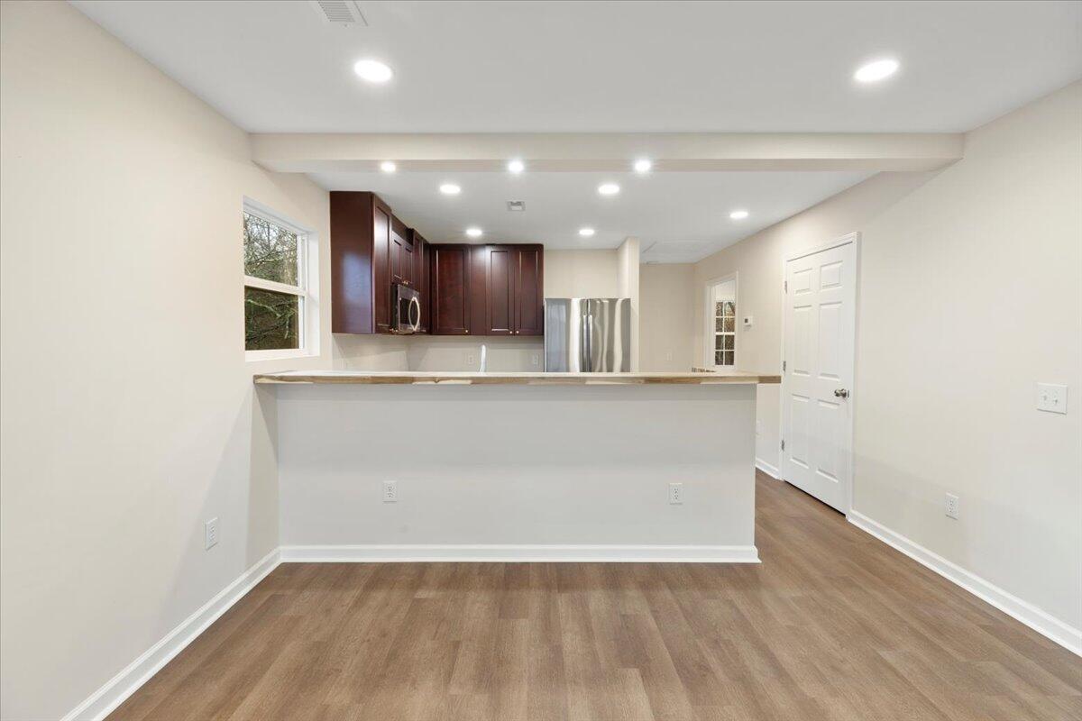 127 State Pulaski, VA 24301 - Photo 13 of 35 a view of kitchen with kitchen island granite countertop stainless steel appliances refrigerator and microwave