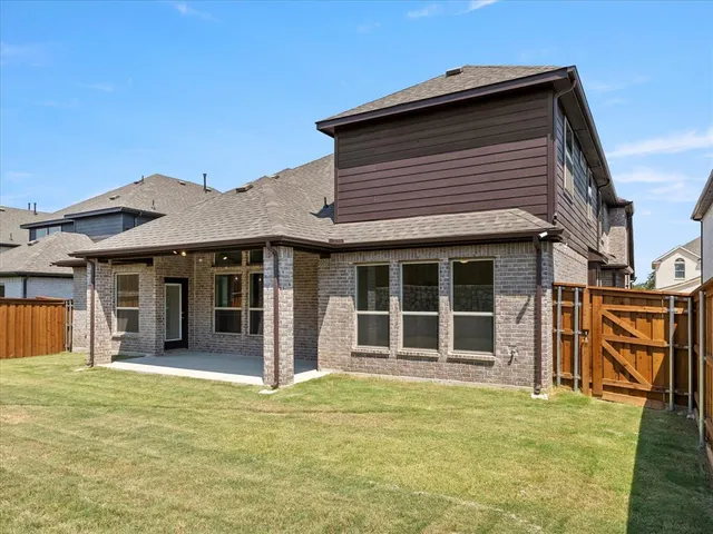 a house view with a garden space