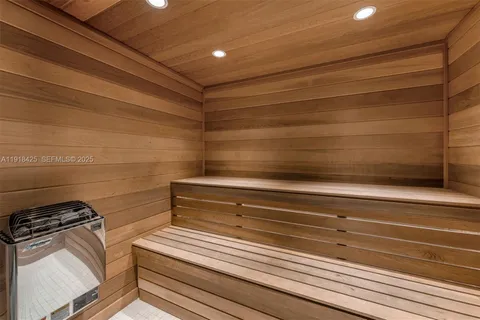 a view of a swimming pool with a table and chairs