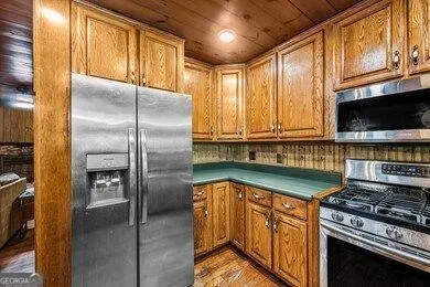 a bathroom with a sink a mirror and a bathtub