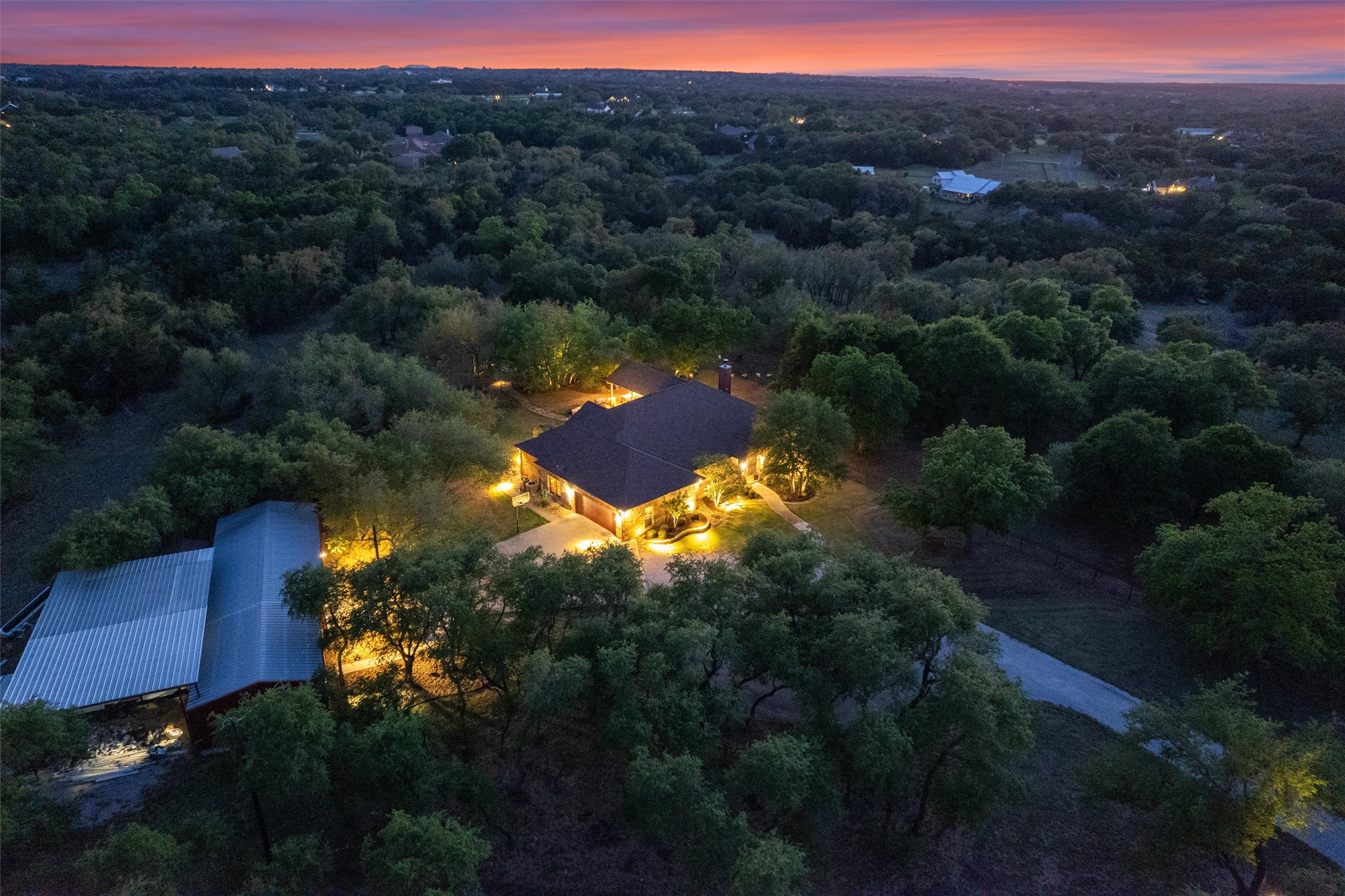 a view of a lake in middle of the forest