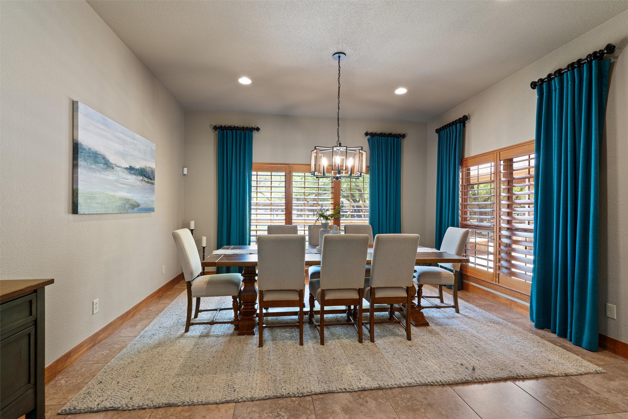 200 Little River Road Liberty Hill, TX 78642 - Photo 13 of 40 a view of a dining room with furniture window and wooden floor
