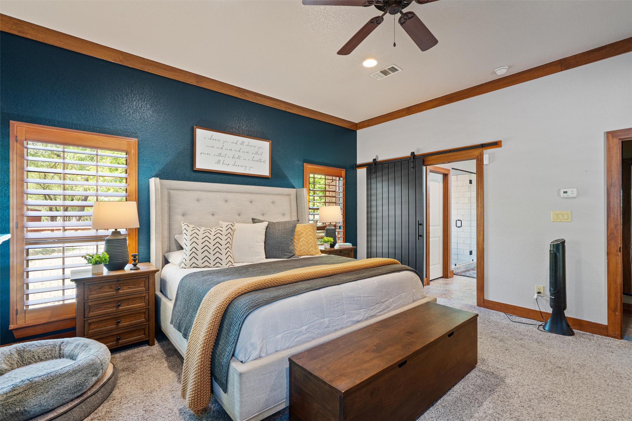 200 Little River Road Liberty Hill, TX 78642 - Photo 17 of 40 a bedroom with bed and window