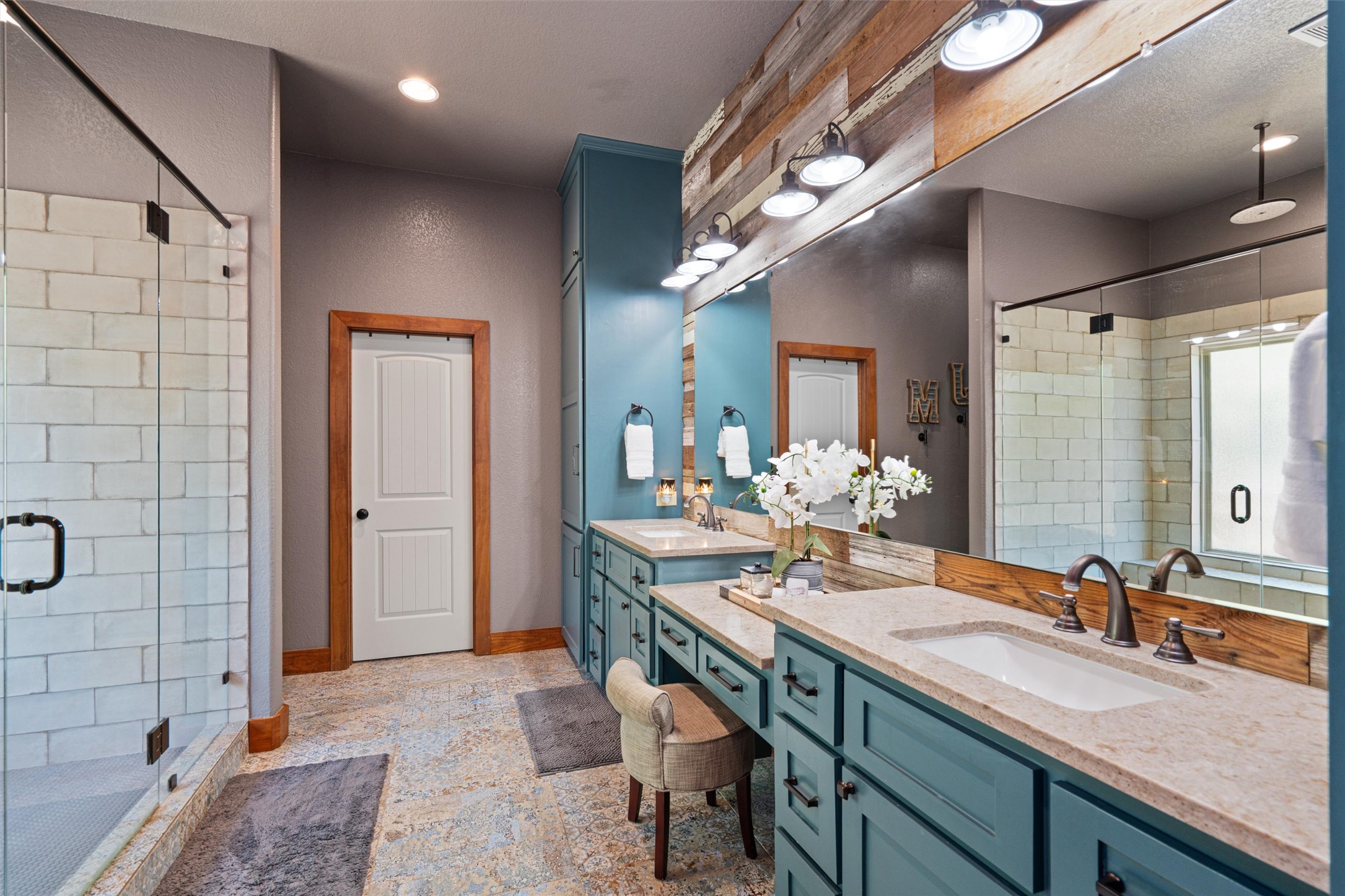 200 Little River Road Liberty Hill, TX 78642 - Photo 20 of 40 a bathroom with a sink a vanity and a mirror