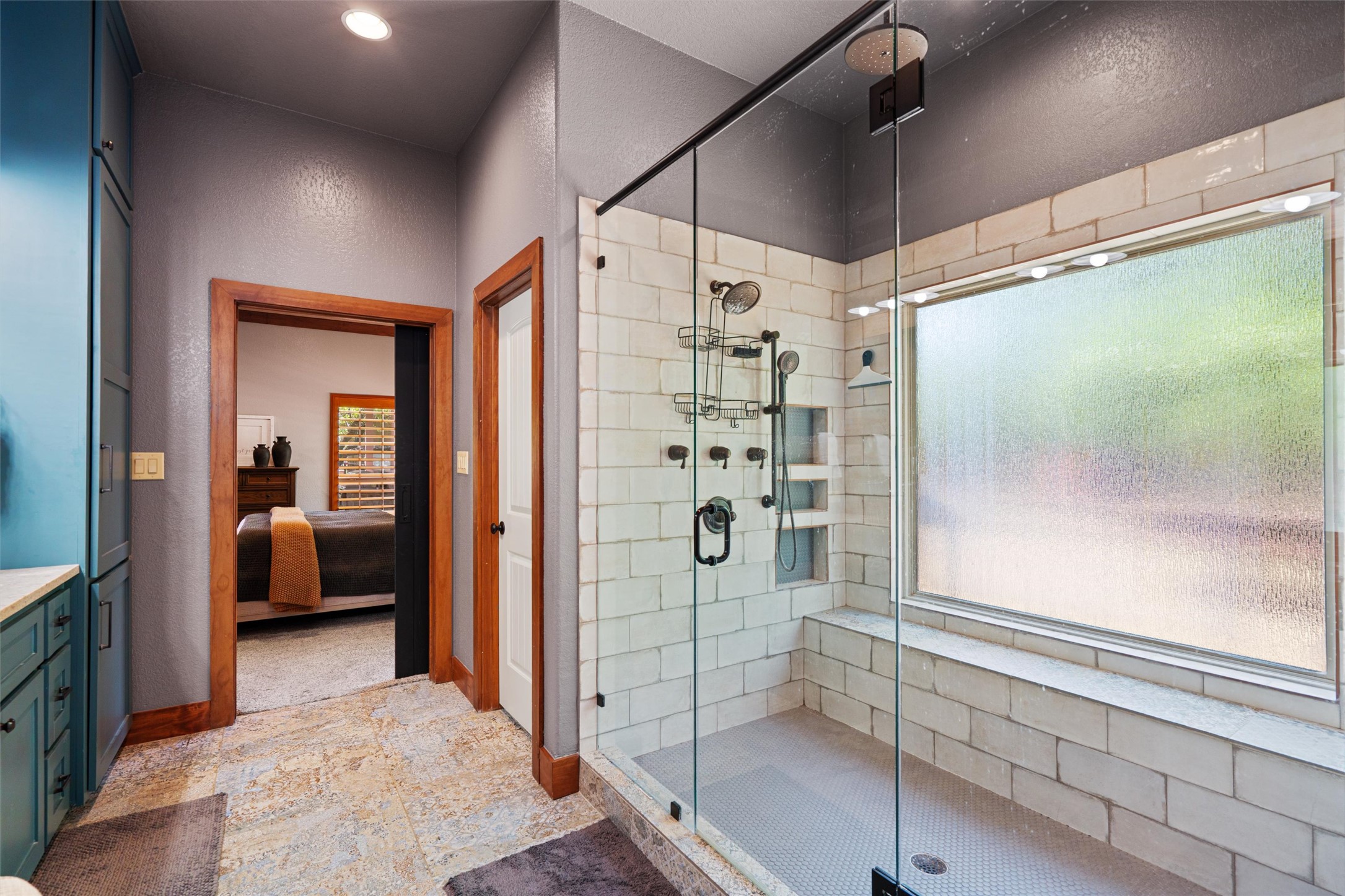 200 Little River Road Liberty Hill, TX 78642 - Photo 21 of 40 a bathroom with a tub and shower