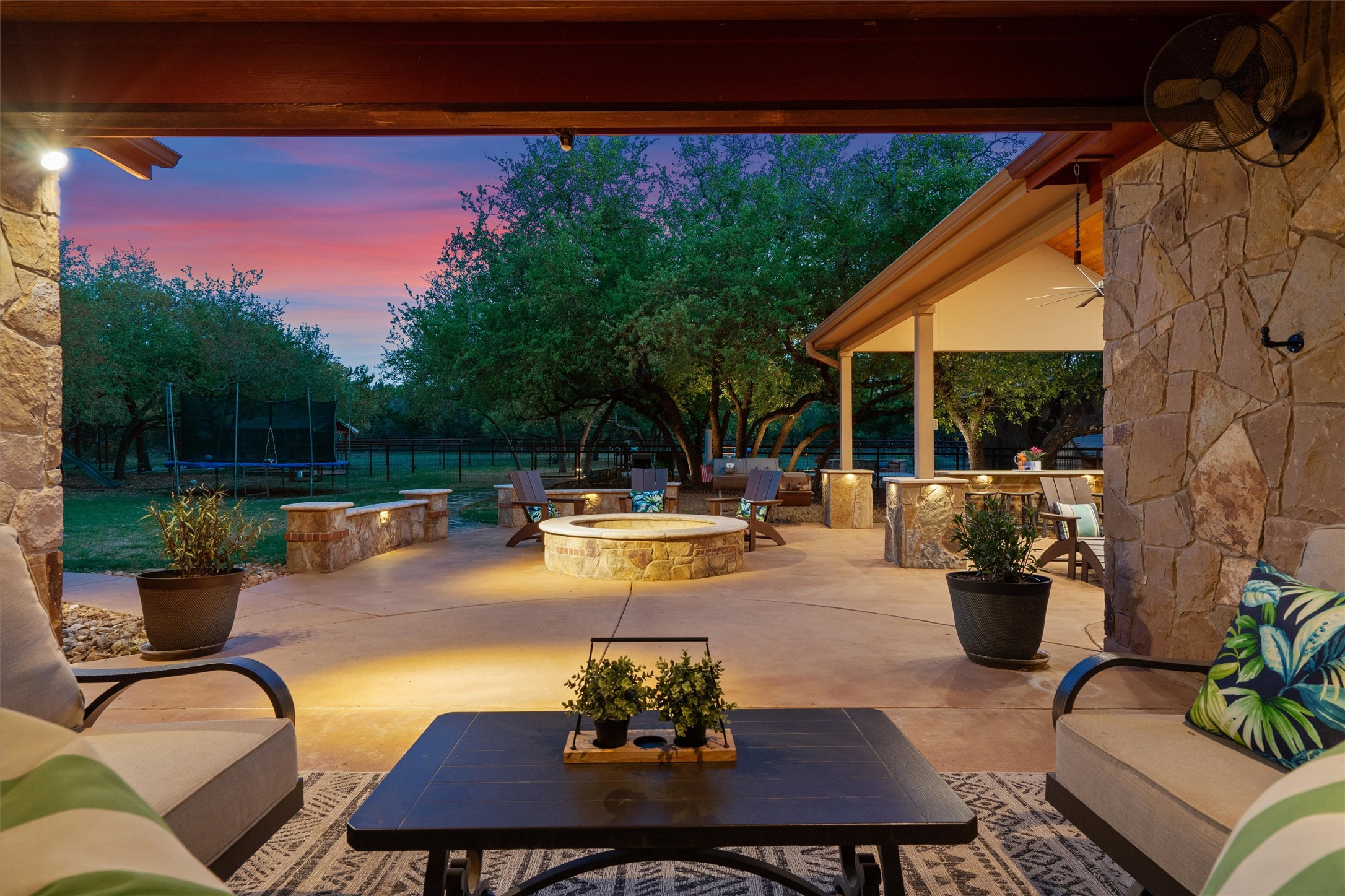 200 Little River Road Liberty Hill, TX 78642 - Photo 22 of 40 a view of a swimming pool with couches chairs and a table