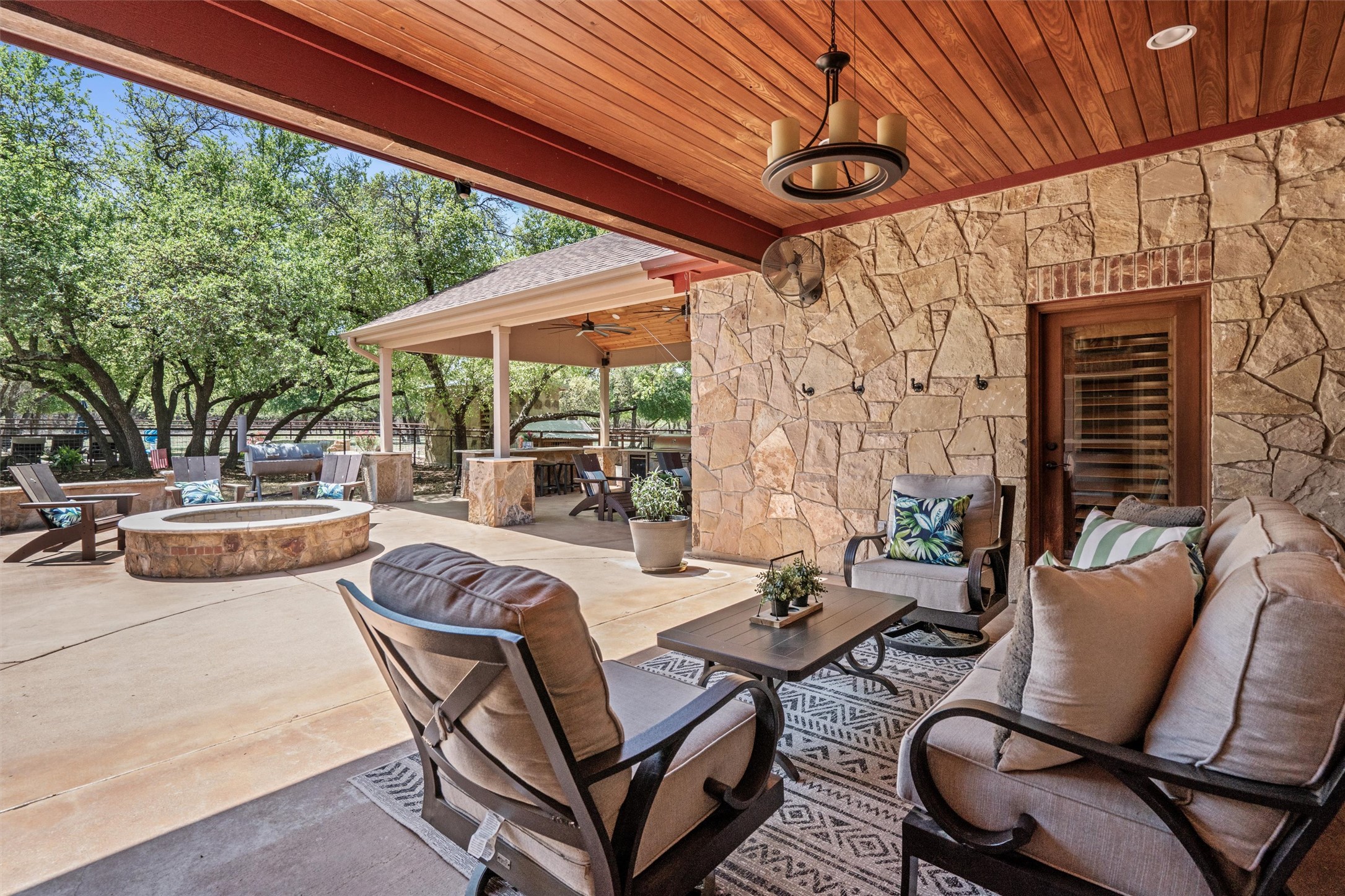 200 Little River Road Liberty Hill, TX 78642 - Photo 23 of 40 a outdoor space with patio furniture and wooden floor